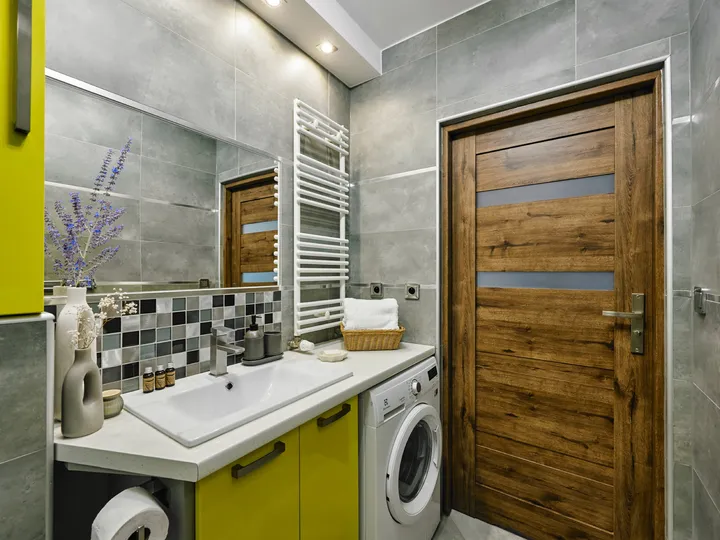Bathroom with a wooden door